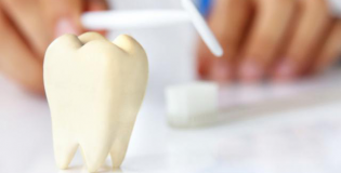 Исуксственный зуб